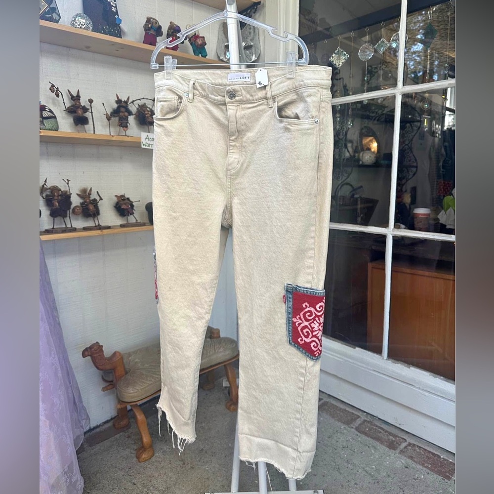 Stylish Cream Jeans with Red Accents